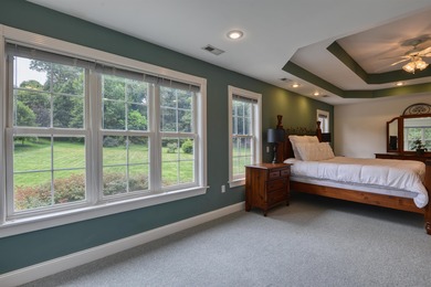 This Stately, all brick colonial is situated on over 1/2 acre on Pete Dye River Course of Virginia Tech in Virginia - for sale on GolfHomes.com, golf home, golf lot