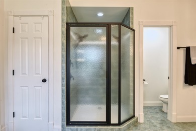 This Stately, all brick colonial is situated on over 1/2 acre on Pete Dye River Course of Virginia Tech in Virginia - for sale on GolfHomes.com, golf home, golf lot