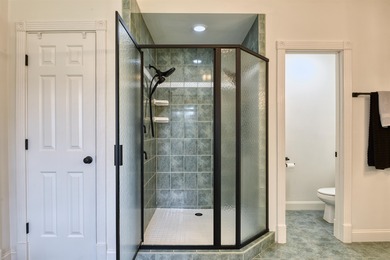 This Stately, all brick colonial is situated on over 1/2 acre on Pete Dye River Course of Virginia Tech in Virginia - for sale on GolfHomes.com, golf home, golf lot