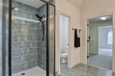 This Stately, all brick colonial is situated on over 1/2 acre on Pete Dye River Course of Virginia Tech in Virginia - for sale on GolfHomes.com, golf home, golf lot