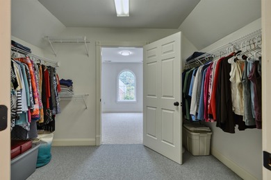 This Stately, all brick colonial is situated on over 1/2 acre on Pete Dye River Course of Virginia Tech in Virginia - for sale on GolfHomes.com, golf home, golf lot