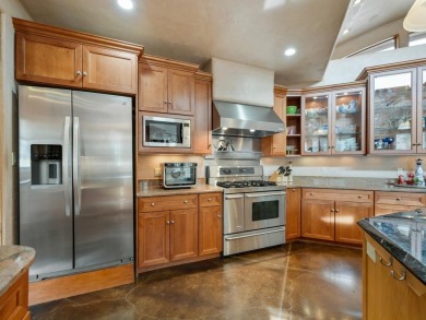 Discover the perfect blend of luxury and outdoor living at this on The Golf Club At Redlands Mesa in Colorado - for sale on GolfHomes.com, golf home, golf lot