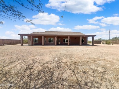 Nestled in the heart of Gold Canyon, this stunning custom home on Superstition Mountain Club - Lost Gold in Arizona - for sale on GolfHomes.com, golf home, golf lot