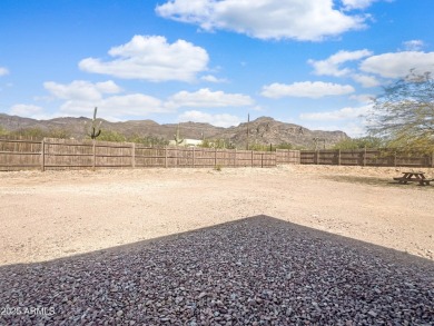 Nestled in the heart of Gold Canyon, this stunning custom home on Superstition Mountain Club - Lost Gold in Arizona - for sale on GolfHomes.com, golf home, golf lot