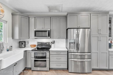 Remodeled 4BR/3BA Lake Home in the gated StillWaters community on Stillwaters Golf and Country Club in Alabama - for sale on GolfHomes.com, golf home, golf lot