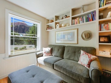 Nestled next to the majestic Colorado National Monument, this on Tiara Rado Golf Course in Colorado - for sale on GolfHomes.com, golf home, golf lot