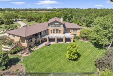 This unique Prairie-Style Craftsman home on 6 acres sits on Prairie Dunes Country Club in Kansas - for sale on GolfHomes.com, golf home, golf lot