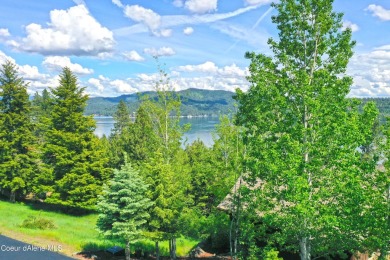 GOLF COURSE LOT WITH LAKE VIEWS AT PRESTIGIOUS BLACK ROCK on The Golf Club at Black Rock in Idaho - for sale on GolfHomes.com, golf home, golf lot