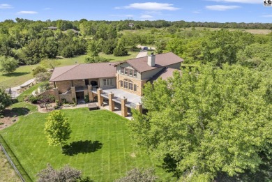 This unique Prairie-Style Craftsman home on 6 acres sits on Prairie Dunes Country Club in Kansas - for sale on GolfHomes.com, golf home, golf lot