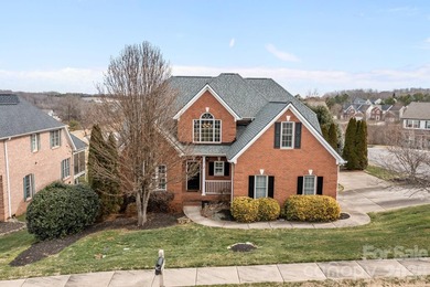 Stunning, custom-built full brick home perfectly positioned with on Fox Den Country Club in North Carolina - for sale on GolfHomes.com, golf home, golf lot