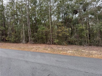 This beautiful 1/4-acre wooded homesite is in the established on Citrus Springs Country Club in Florida - for sale on GolfHomes.com, golf home, golf lot