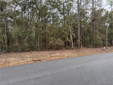 This beautiful 1/4-acre wooded homesite is in the established on Citrus Springs Country Club in Florida - for sale on GolfHomes.com, golf home, golf lot