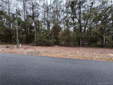 This beautiful 1/4-acre wooded homesite is in the established on Citrus Springs Country Club in Florida - for sale on GolfHomes.com, golf home, golf lot