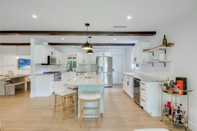 Beautifully updated turn-key home in desirable Hollywood Lakes on Hollywood Beach Golf and Country Club in Florida - for sale on GolfHomes.com, golf home, golf lot