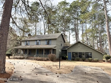 Welcome to this well-located, 4 bedroom 2.5 bath home nestled in on Scotch Meadows Country Club in North Carolina - for sale on GolfHomes.com, golf home, golf lot