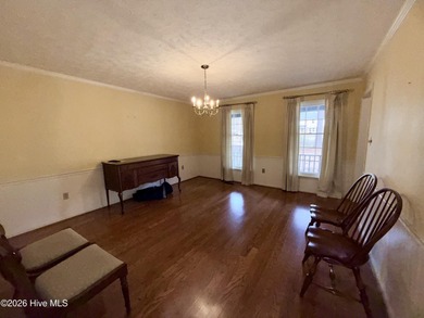 Welcome to this well-located, 4 bedroom 2.5 bath home nestled in on Scotch Meadows Country Club in North Carolina - for sale on GolfHomes.com, golf home, golf lot