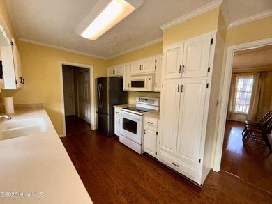 Welcome to this well-located, 4 bedroom 2.5 bath home nestled in on Scotch Meadows Country Club in North Carolina - for sale on GolfHomes.com, golf home, golf lot