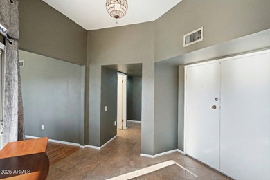 Step inside a residence that blends comfort with a polished on Sun City Lakes West and East in Arizona - for sale on GolfHomes.com, golf home, golf lot