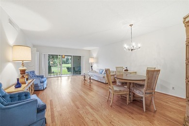 Discover sweeping golf course views from this well-located on Palm-Aire Country Club and Resort - The Oaks in Florida - for sale on GolfHomes.com, golf home, golf lot