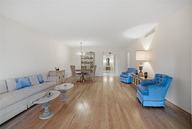 Discover sweeping golf course views from this desirable on Palm-Aire Country Club and Resort - The Oaks in Florida - for sale on GolfHomes.com, golf home, golf lot