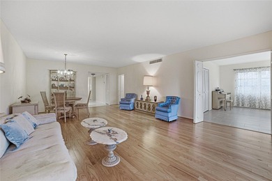 Discover sweeping golf course views from this desirable on Palm-Aire Country Club and Resort - The Oaks in Florida - for sale on GolfHomes.com, golf home, golf lot