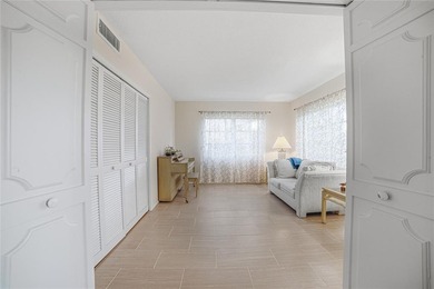 Discover sweeping golf course views from this well-located on Palm-Aire Country Club and Resort - The Oaks in Florida - for sale on GolfHomes.com, golf home, golf lot