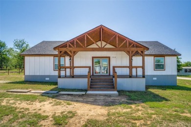 Discover the charm of 104 Buffalo Ct, a welcoming home nestled on The Club At Runaway Bay in Texas - for sale on GolfHomes.com, golf home, golf lot