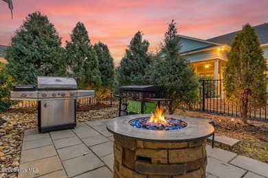 The welcoming front porch sets the tone for this beautiful home on Members Club At St. James Plantation in North Carolina - for sale on GolfHomes.com, golf home, golf lot