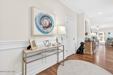 The welcoming front porch sets the tone for this beautiful home on Members Club At St. James Plantation in North Carolina - for sale on GolfHomes.com, golf home, golf lot