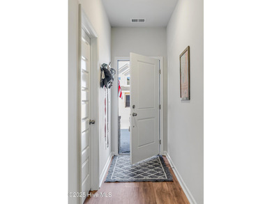 This Blakely Townhome plan is a two story - end unit with a 1 on Brunswick Plantation and Golf Resorts in North Carolina - for sale on GolfHomes.com, golf home, golf lot