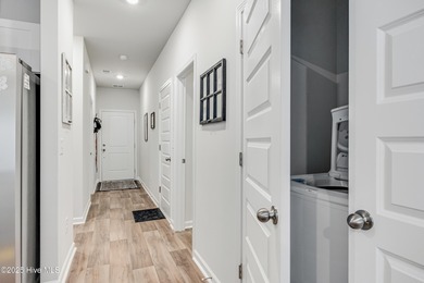 This Blakely Townhome plan is a two story - end unit with a 1 on Brunswick Plantation and Golf Resorts in North Carolina - for sale on GolfHomes.com, golf home, golf lot