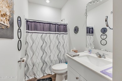 This Blakely Townhome plan is a two story - end unit with a 1 on Brunswick Plantation and Golf Resorts in North Carolina - for sale on GolfHomes.com, golf home, golf lot