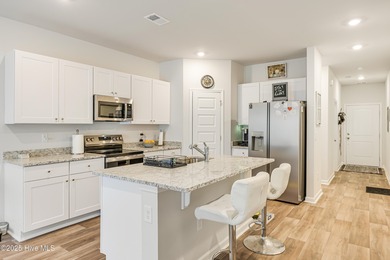 This Blakely Townhome plan is a two story - end unit with a 1 on Brunswick Plantation and Golf Resorts in North Carolina - for sale on GolfHomes.com, golf home, golf lot