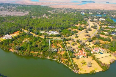 Enjoy the privacy and beauty of this stunning lakefront homesite on Frederica Golf Club in Georgia - for sale on GolfHomes.com, golf home, golf lot