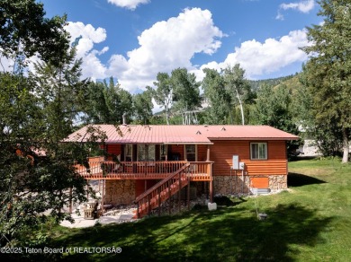 Tucked back on a secluded 1 acre lot sits this 3 bedroom 3 bath on Star Valley RV Golf Course in Wyoming - for sale on GolfHomes.com, golf home, golf lot