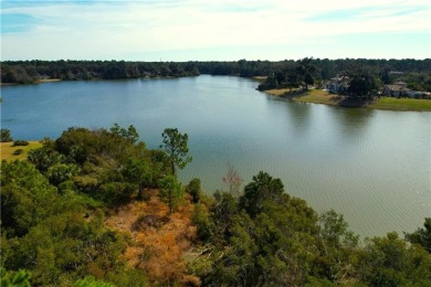 Enjoy the privacy and beauty of this stunning lakefront homesite on Frederica Golf Club in Georgia - for sale on GolfHomes.com, golf home, golf lot