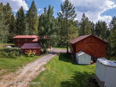 Tucked back on a secluded 1 acre lot sits this 3 bedroom 3 bath on Star Valley RV Golf Course in Wyoming - for sale on GolfHomes.com, golf home, golf lot