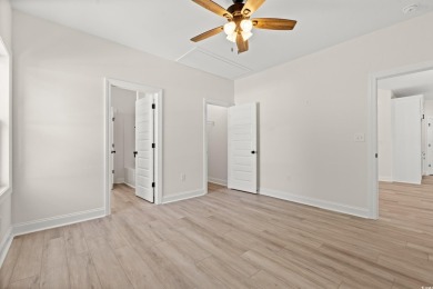 Welcome to your new beach house paradise! This new construction on Beachwood Golf Club in South Carolina - for sale on GolfHomes.com, golf home, golf lot