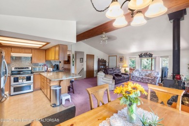 Tucked back on a secluded 1 acre lot sits this 3 bedroom 3 bath on Star Valley RV Golf Course in Wyoming - for sale on GolfHomes.com, golf home, golf lot