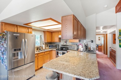 Tucked back on a secluded 1 acre lot sits this 3 bedroom 3 bath on Star Valley RV Golf Course in Wyoming - for sale on GolfHomes.com, golf home, golf lot