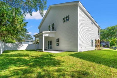Welcome to your new beach house paradise! This new construction on Beachwood Golf Club in South Carolina - for sale on GolfHomes.com, golf home, golf lot