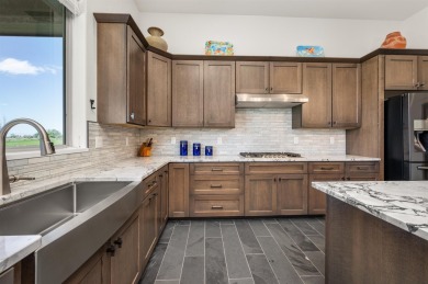 Welcome to this exquisite custom-built ranch-style home on Adobe Creek National Golf Course in Colorado - for sale on GolfHomes.com, golf home, golf lot