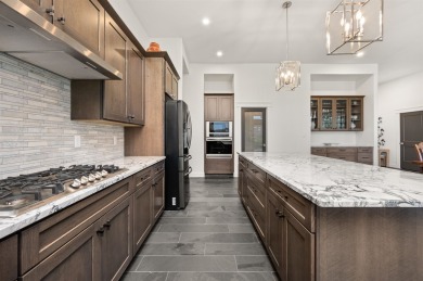 Welcome to this exquisite custom-built ranch-style home on Adobe Creek National Golf Course in Colorado - for sale on GolfHomes.com, golf home, golf lot