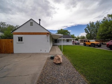 Move-in-ready 3-bedroom, 1-bath home located near Colorado Mesa on Lincoln Park Golf Course in Colorado - for sale on GolfHomes.com, golf home, golf lot