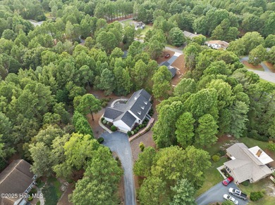 Welcome to 109 Sweetbriar Court, a gracious blend of timeless on Seven Lakes Country Club in North Carolina - for sale on GolfHomes.com, golf home, golf lot