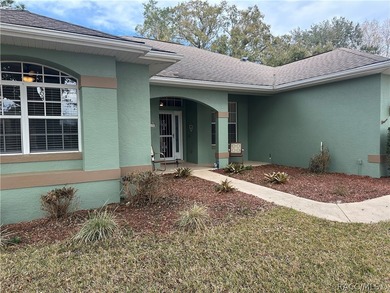Welcome home to easy Florida living in this beautifully on Twisted Oaks Golf Club in Florida - for sale on GolfHomes.com, golf home, golf lot