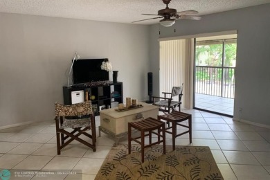 Great second floor 2 bedroom, 2 bath condo with large patio on Deer Creek Golf Club in Florida - for sale on GolfHomes.com, golf home, golf lot