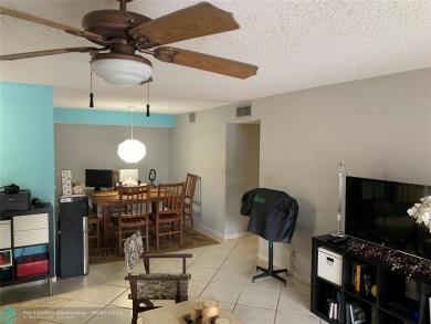 Great second floor 2 bedroom, 2 bath condo with large patio on Deer Creek Golf Club in Florida - for sale on GolfHomes.com, golf home, golf lot