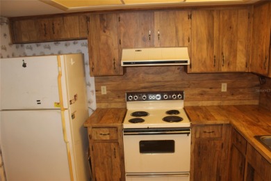 PROBATE DEAL!!! Property is priced to sell and ready for a quick on Cypresswood Golf and Country Club in Florida - for sale on GolfHomes.com, golf home, golf lot