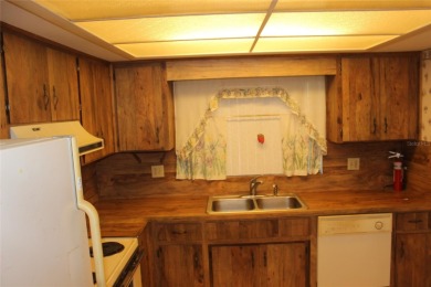 PROBATE DEAL!!! Property is priced to sell and ready for a quick on Cypresswood Golf and Country Club in Florida - for sale on GolfHomes.com, golf home, golf lot
